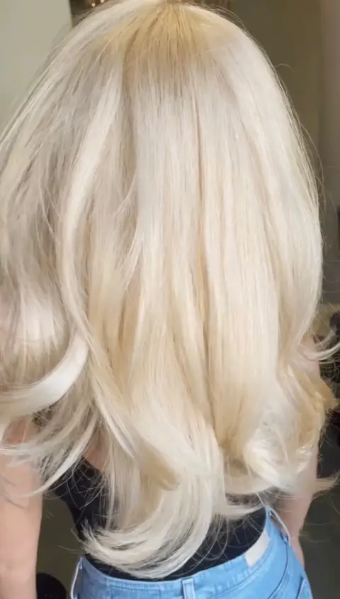 Platinum blonde transformation — bleach and tone work by Rachel Charles, Phoenix Redken-Certified Colorist.