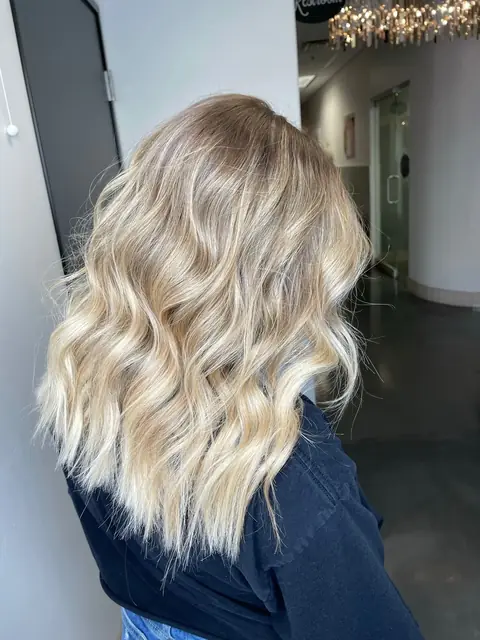 Beachy lived-in blonde balayage with natural regrowth — Phoenix blonde specialist Rachel Charles.
