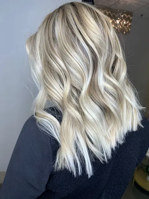 Dimensional blonde balayage — multi-tone hand-painted color with seamless grow-out. Phoenix blonde specialist Rachel Charles.