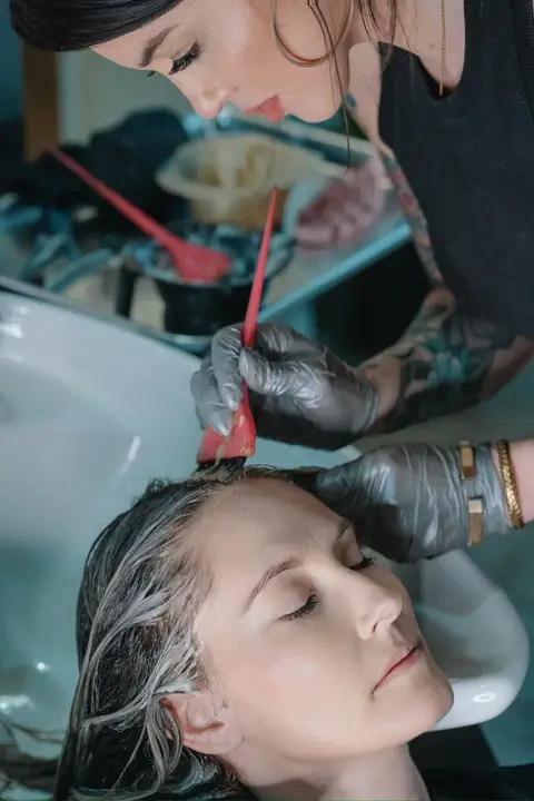 Behind the scenes — color gloss application at the shampoo bowl by Rachel Charles, Phoenix.