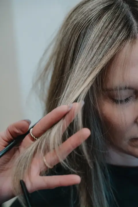 Behind the scenes — flat-iron finishing on dimensional blonde. Hair By Rachel Charles, Phoenix.